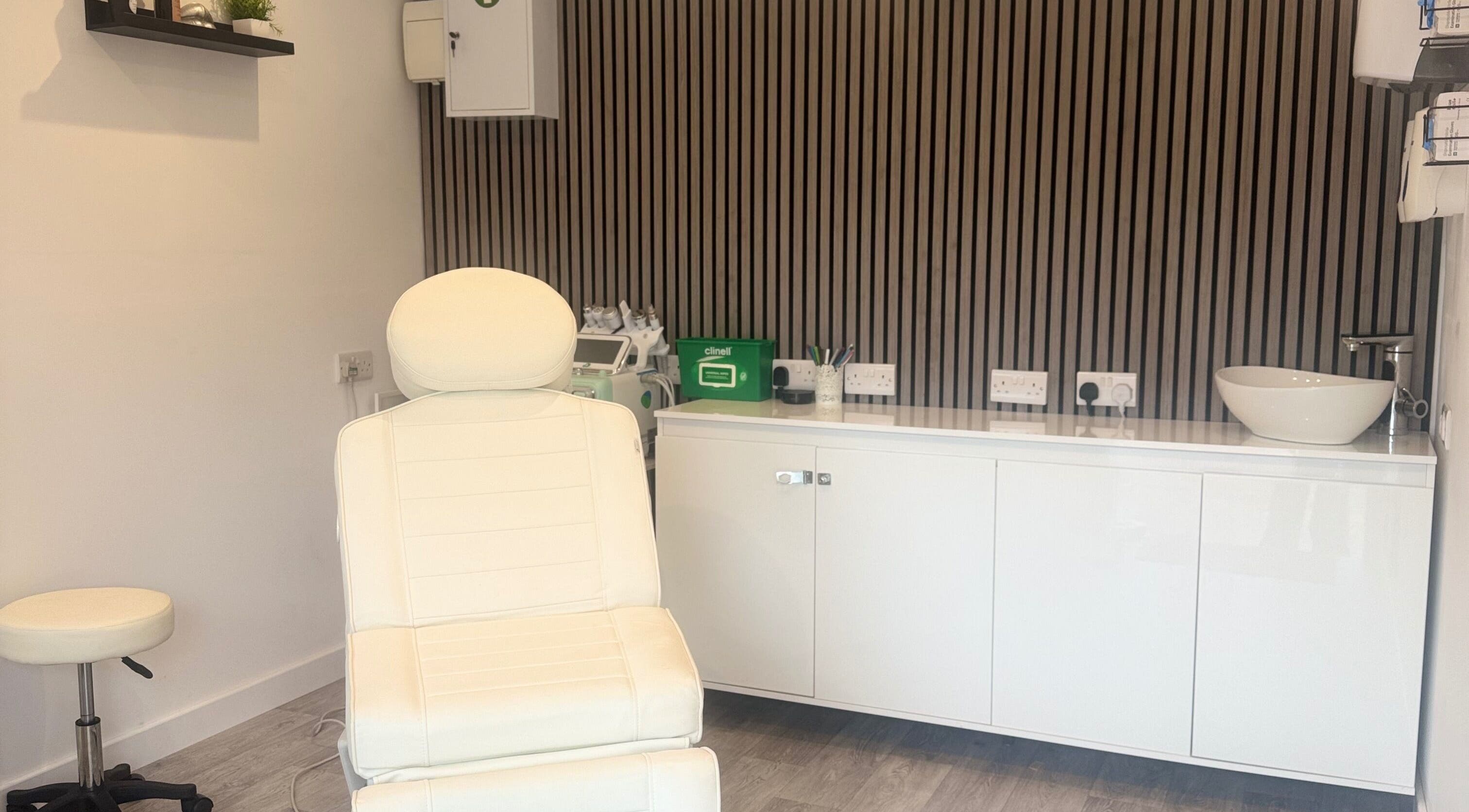 Modern treatment room at Hair and Aesthetics by Sophie in Marlow, England, GB, with sleek decor and comfortable chair.