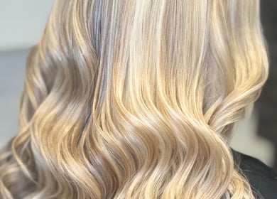Blonde wavy hair styled at Hair and Aesthetics by Sophie, Marlow, England, GB.