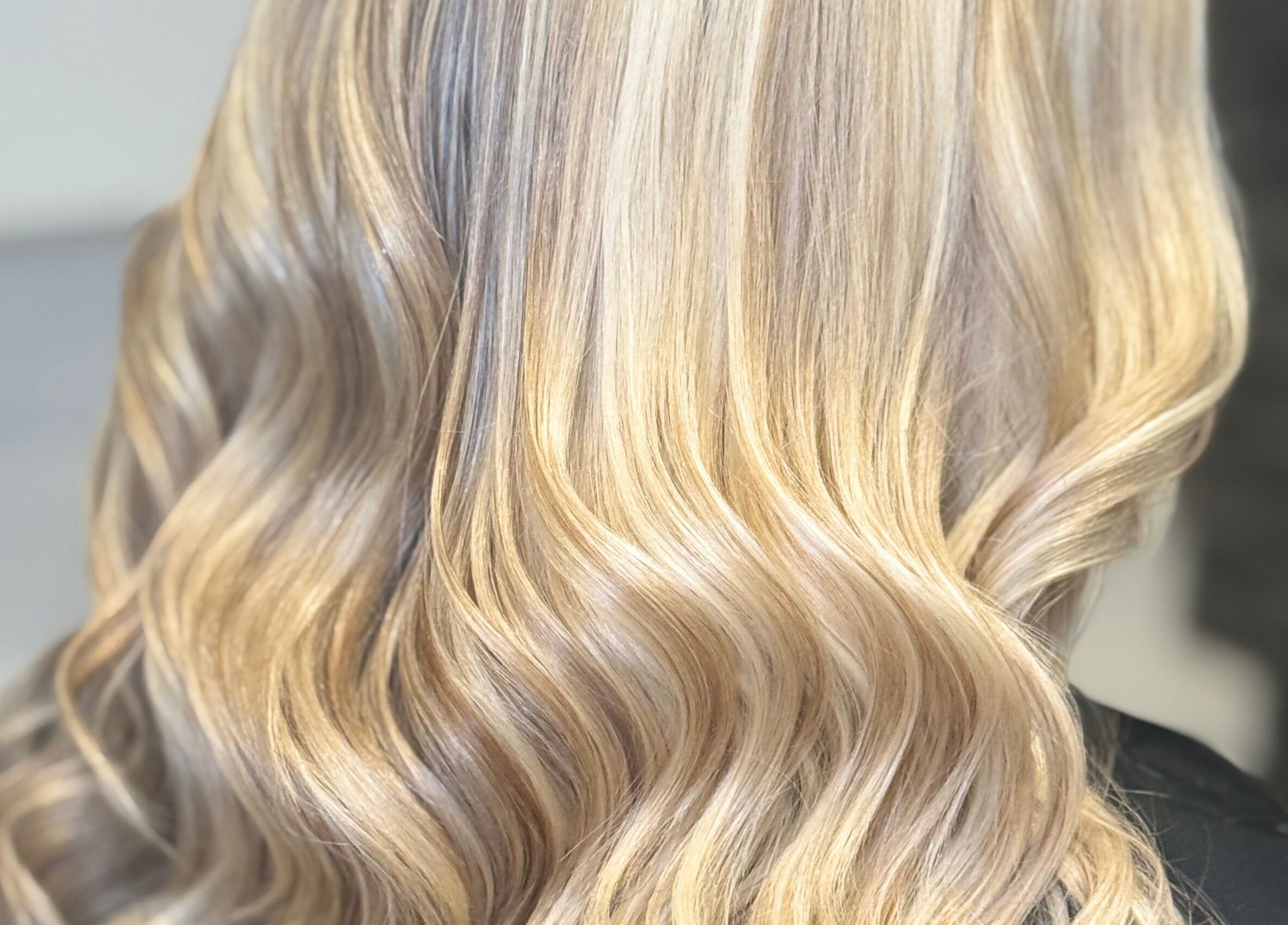 Blonde wavy hair styled at Hair and Aesthetics by Sophie, Marlow, England, GB.