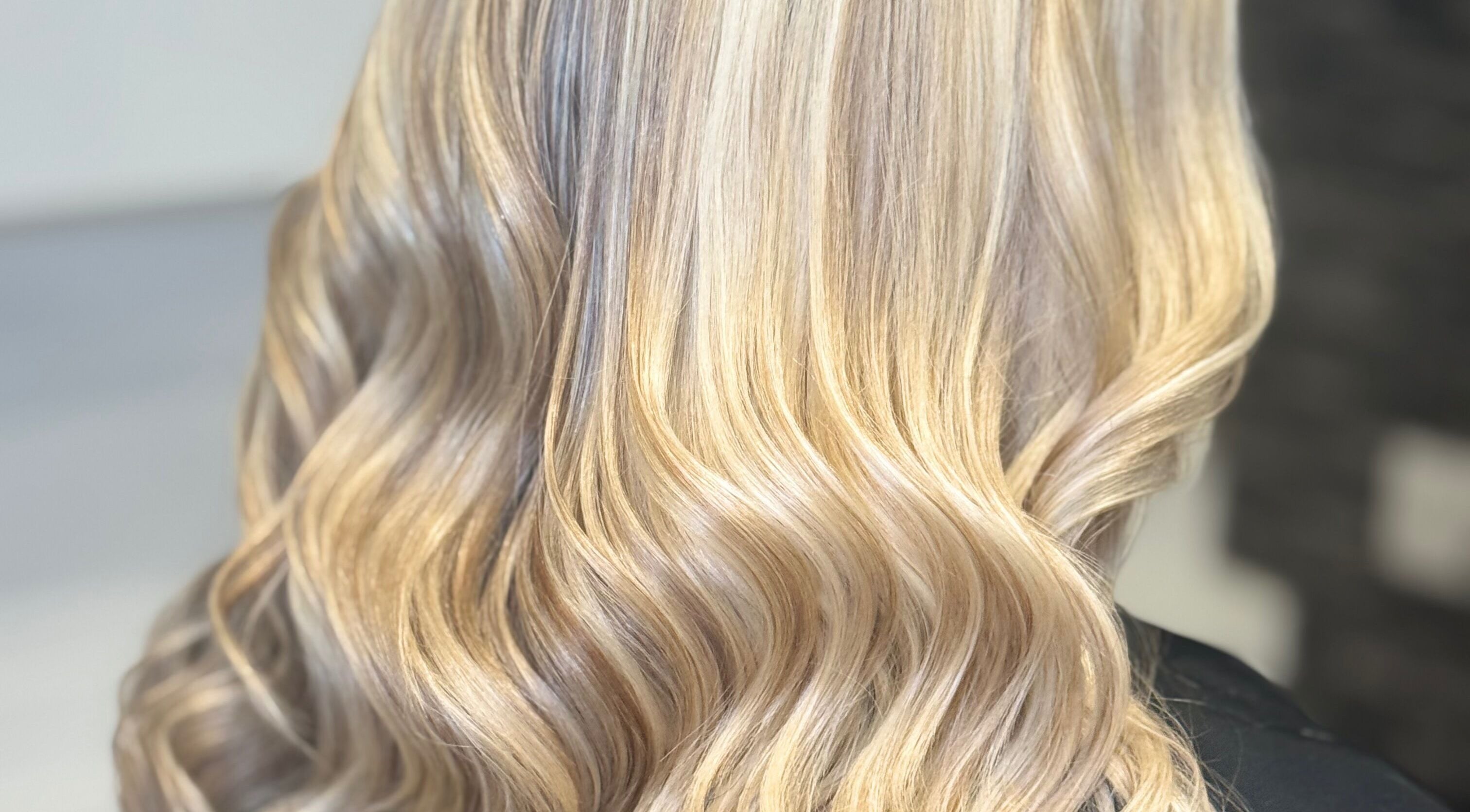 Blonde wavy hair styled at Hair and Aesthetics by Sophie, Marlow, England, GB.