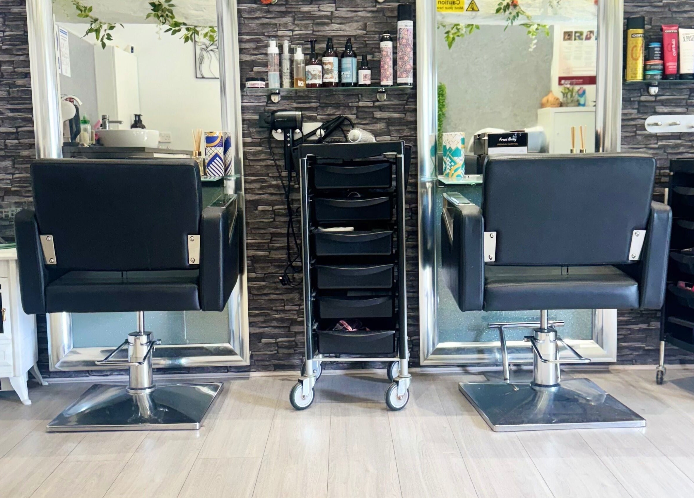 Modern salon interior with styling chairs at Hair and Aesthetics by Sophie, Marlow, England, GB.