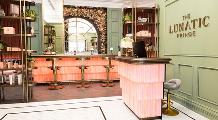 Luxurious interior of Lunatic Fringe Ladies Salon in Dubai, Dubai, AE, featuring elegant décor and lighting.