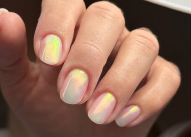 Shimmering nail art at iloNails.tech in Worcester, England, GB showcasing rainbow hues.