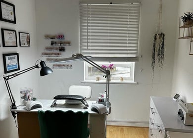 Modern nail studio at iloNails.tech, Worcester, England, GB with certificates and stylish decor.