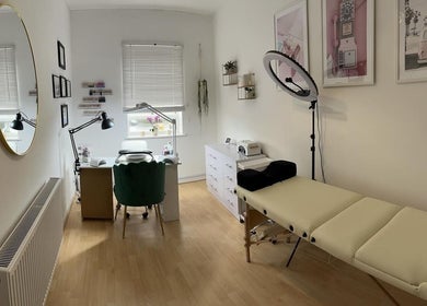 Modern nail room at Ilo Nails.Tech, Worcester, England, GB featuring a manicure table and treatment bed.