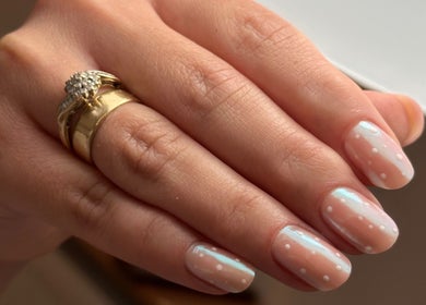 Stylish polka dot manicure at iloNails.tech in Worcester, England, GB. Perfectly polished nails with elegant design.