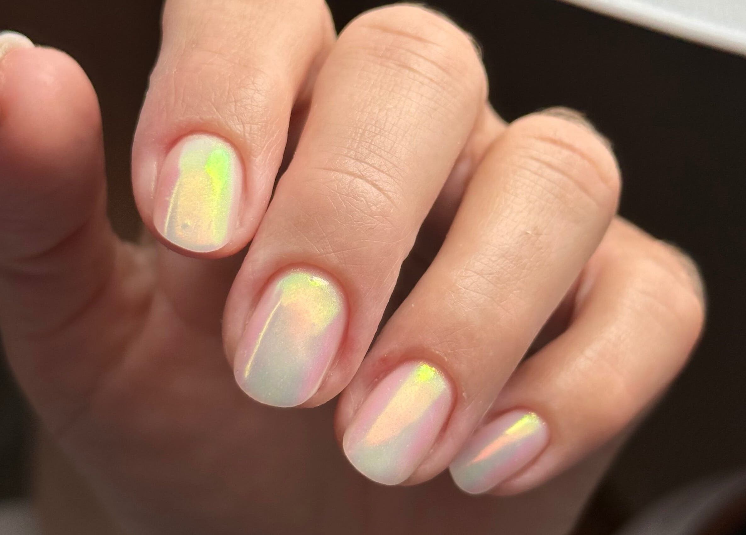 Close-up of neon shimmer nails at iloNails.tech, Worcester, England, GB, showcasing a vibrant manicure.