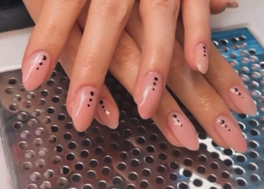 Manicured nails with black dots design at The One Hand and Foot Spa, Roscommon, County Roscommon, IE.