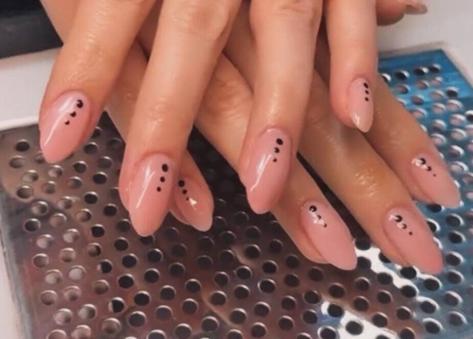Manicured nails with black dots design at The One Hand and Foot Spa, Roscommon, County Roscommon, IE.