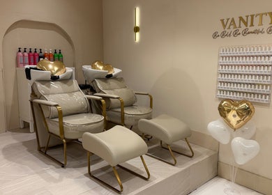 Luxurious beige salon chairs at Vanity in Stoke-on-Trent, England, GB, featuring heart-shaped balloons.