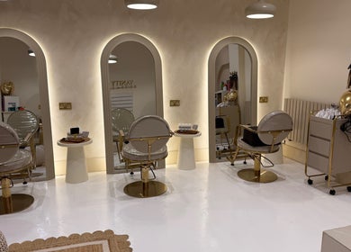 Elegant styling chairs and mirrors at Vanity salon in Stoke-on-Trent, England, GB.