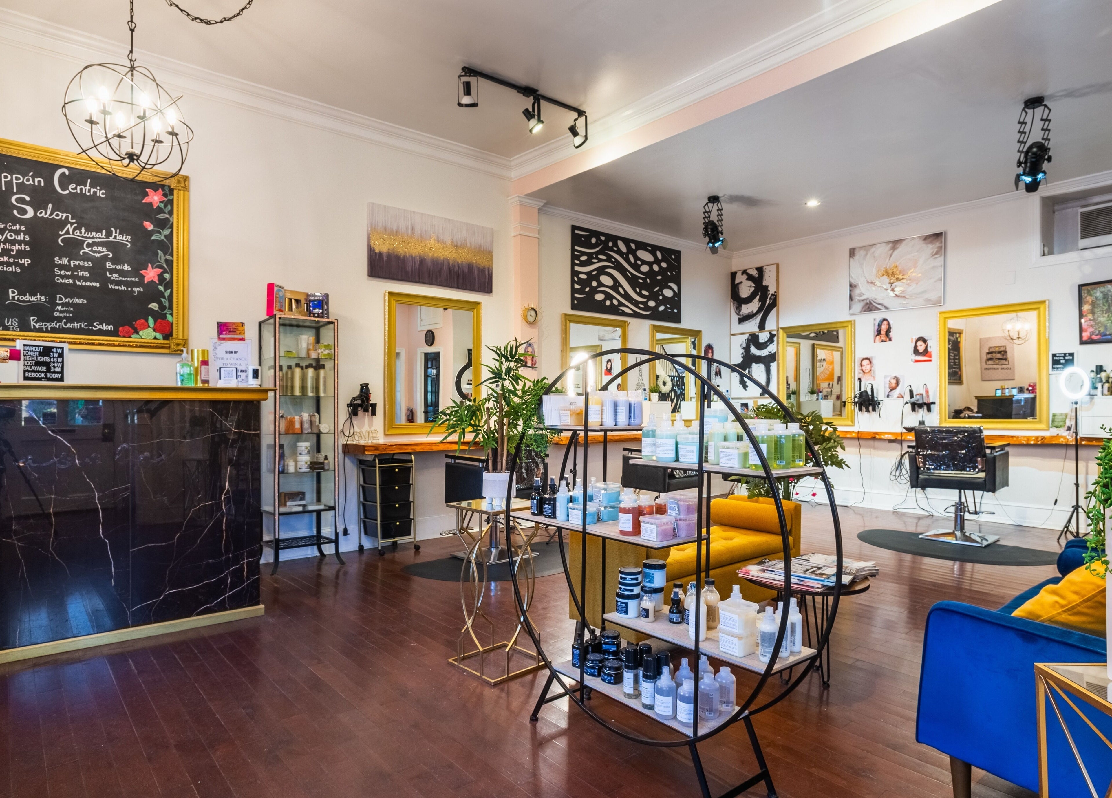 Interior of Reppán Centric Salon in Philadelphia, Pennsylvania, US, featuring stylish decor and beauty products.