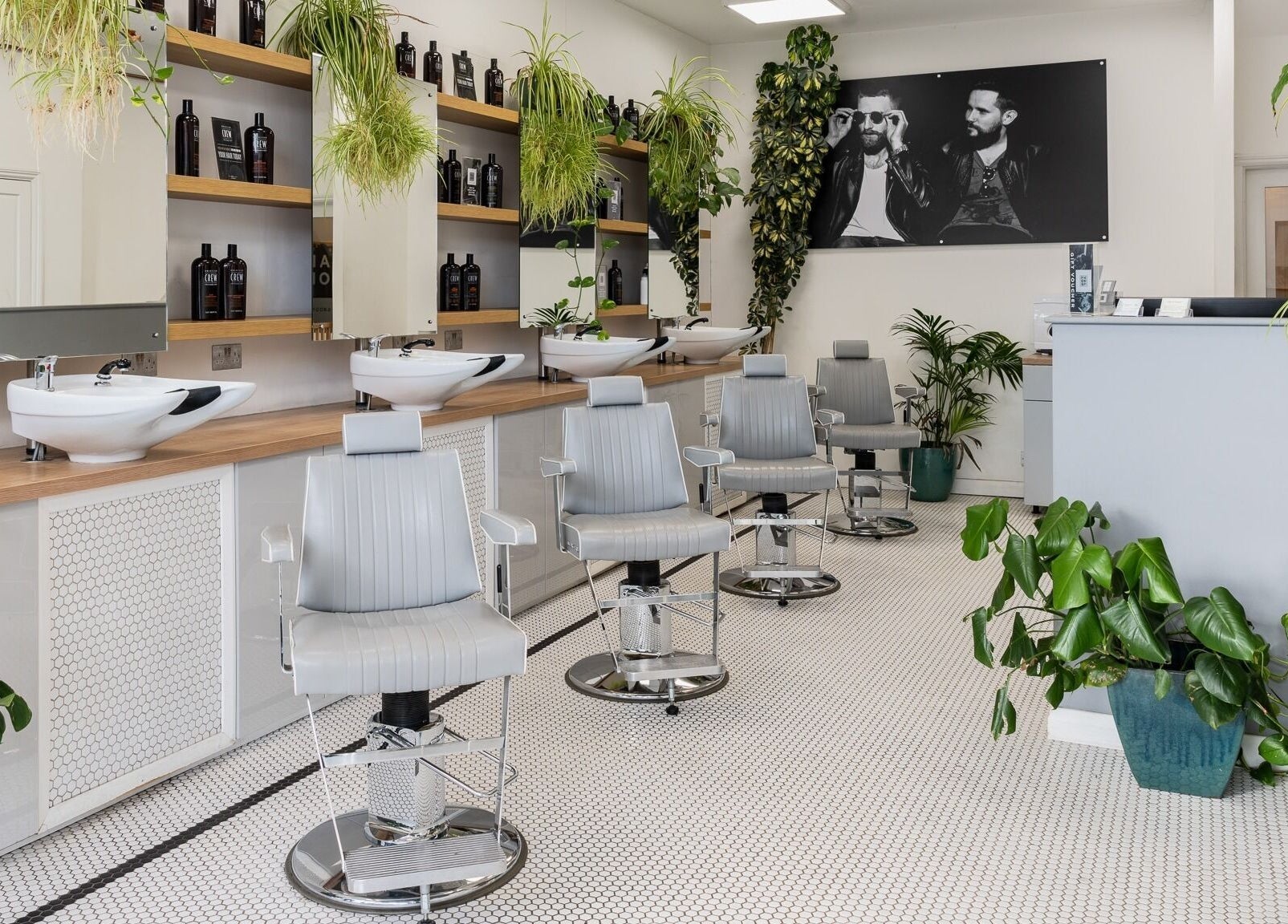 Modern, stylish salon chairs and vibrant plants at Yallop, London, England, GB.