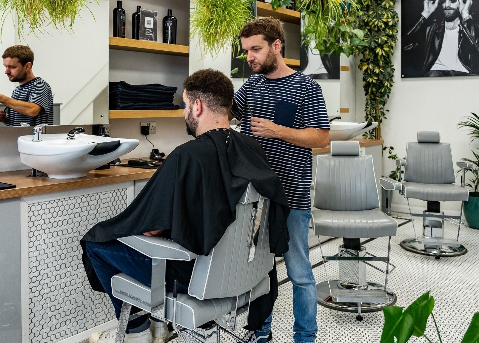 Yallop hairstylist working with client in a chic salon in London, England, GB.