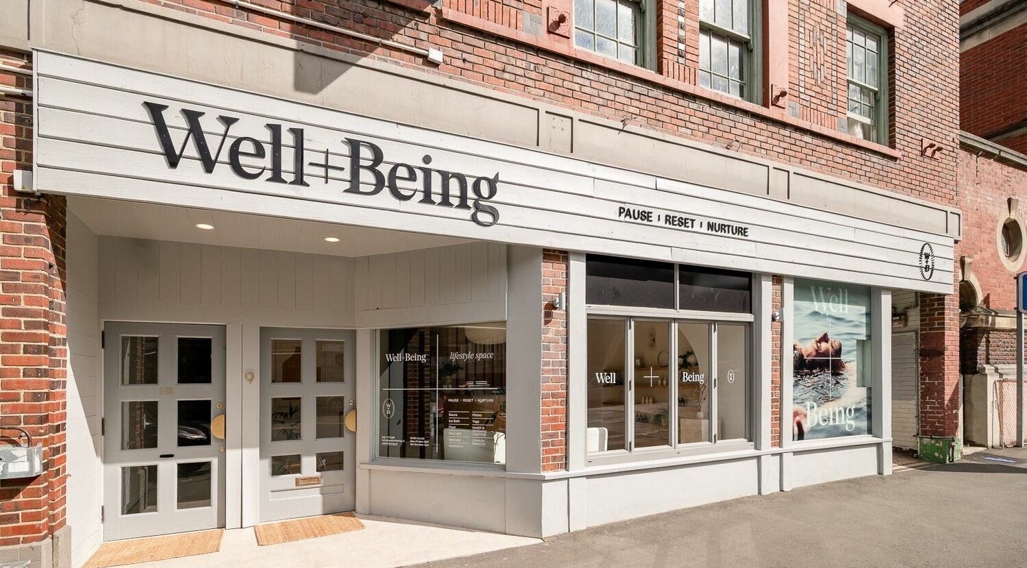 Discover Well and Being's charming entrance in Dunedin, Otago, NZ, a premier beauty and wellness destination.