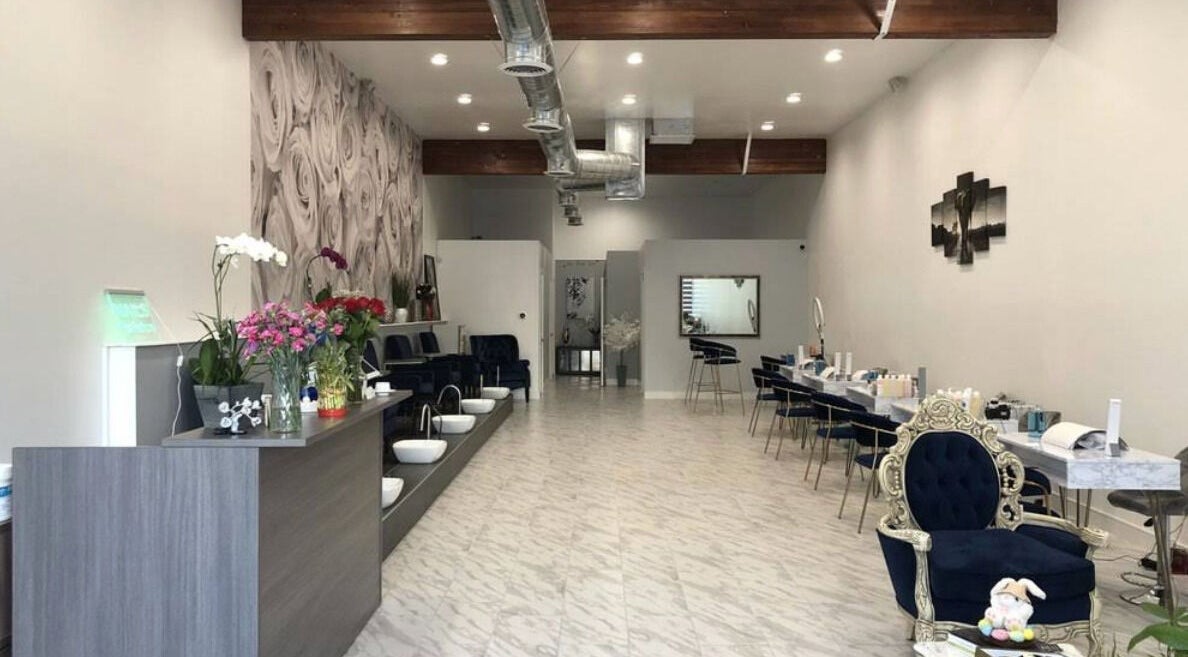 Chic interior of Nail Republic in Los Angeles, California, US featuring stylish seating and floral decor.
