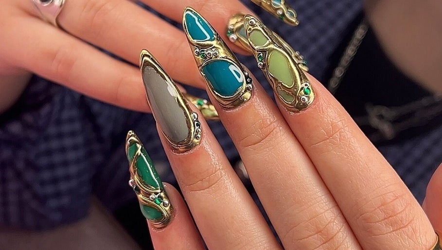 Intricate nail art design at Dimepiece Beauty in Melbourne, Victoria, AU featuring gemstone embellishments.