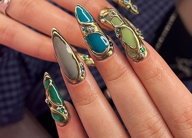 Intricate nail art design at Dimepiece Beauty in Melbourne, Victoria, AU featuring gemstone embellishments.