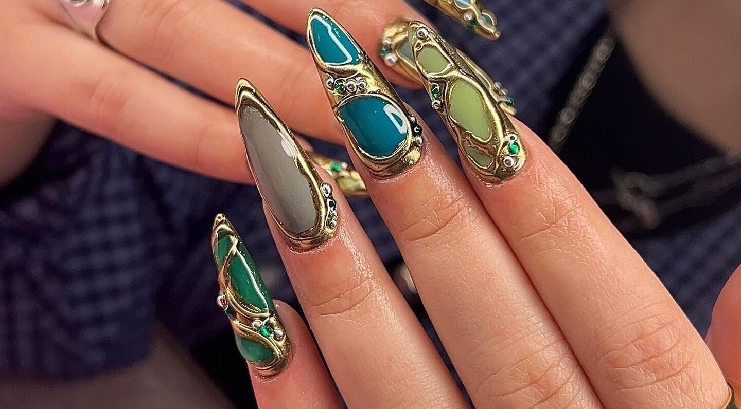 Intricate nail art design at Dimepiece Beauty in Melbourne, Victoria, AU featuring gemstone embellishments.