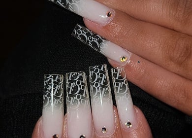 Elegant nail art at Dimepiece Beauty, Melbourne, Victoria, AU with intricate designs and rhinestones.