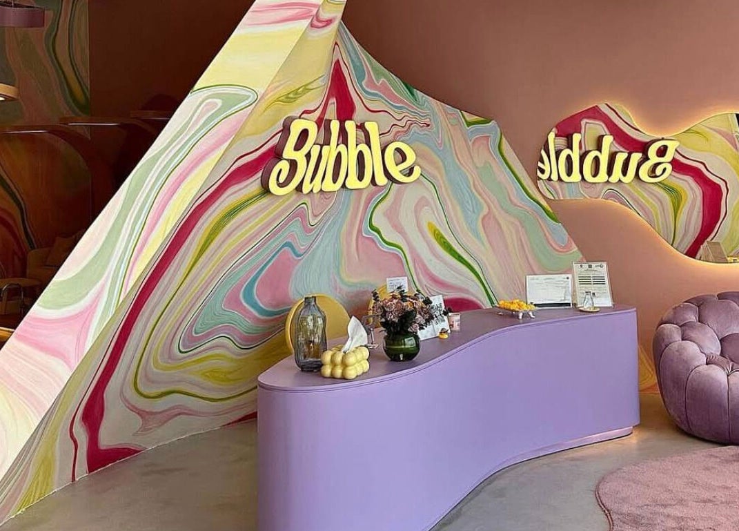 Vibrant Bubble lobby in Riyadh, Riyadh Province, SA features colorful walls and modern decor.