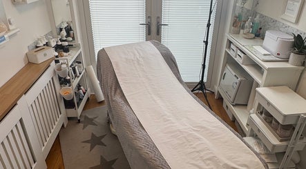 Spa treatment room at Beauty Suite by Annabel, Eastleigh, England, GB, featuring a cozy treatment table.