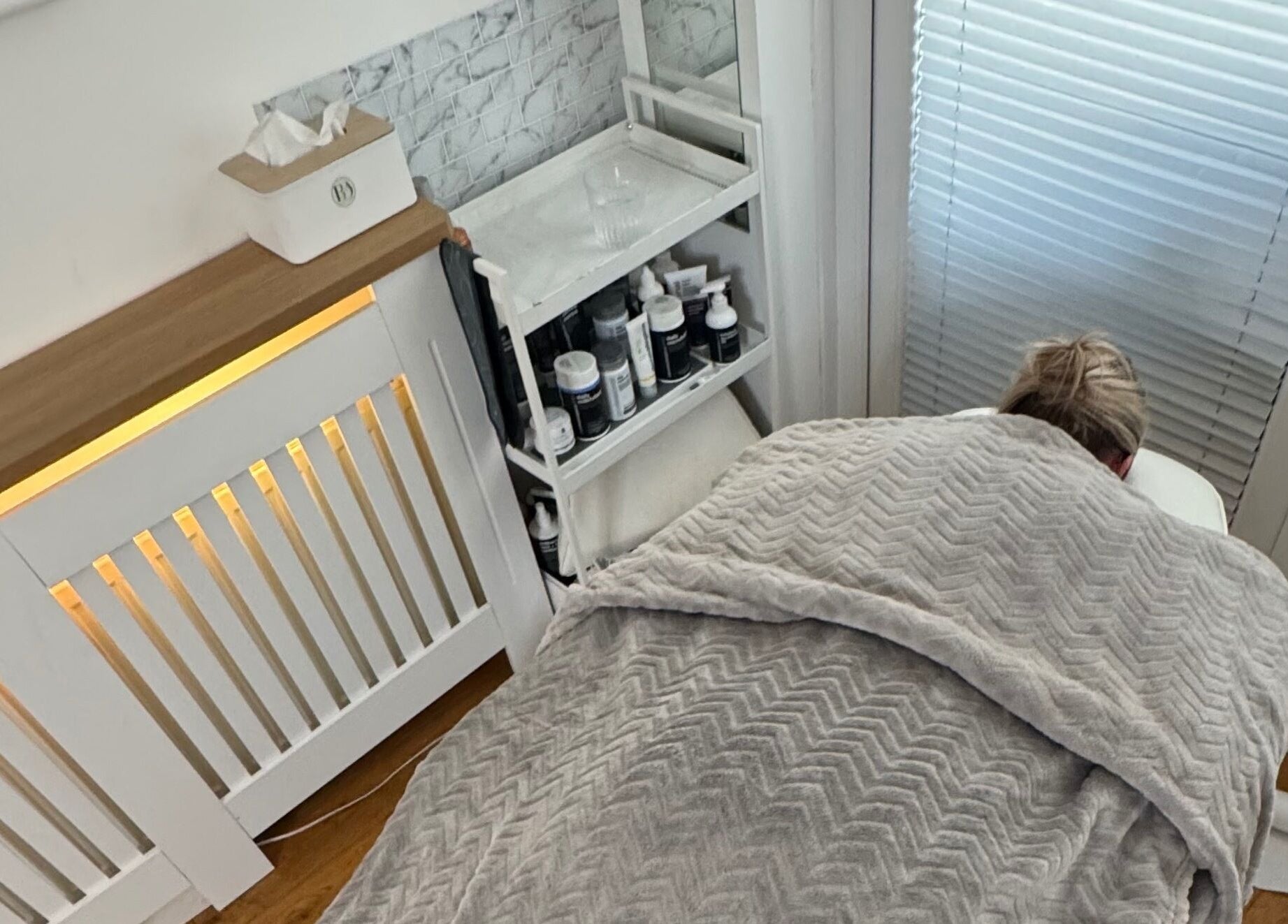 Cozy massage setup at Beauty Suite by Annabel, Eastleigh, England, GB, with a client on a treatment table.