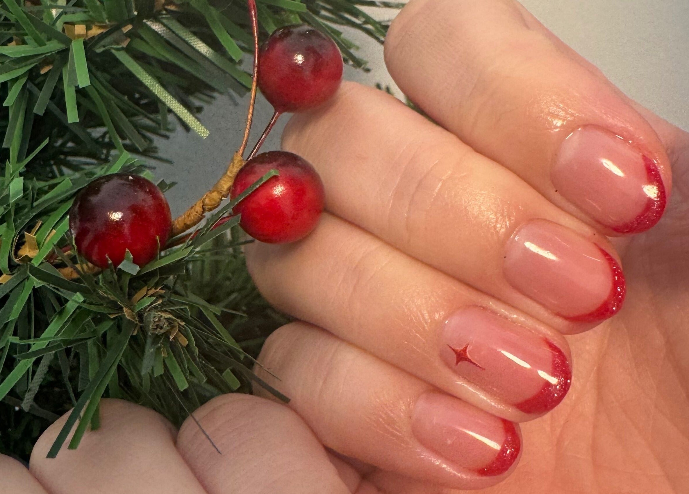 Red-tipped festive manicure at Beauty Suite by Annabel, Eastleigh, England, GB.