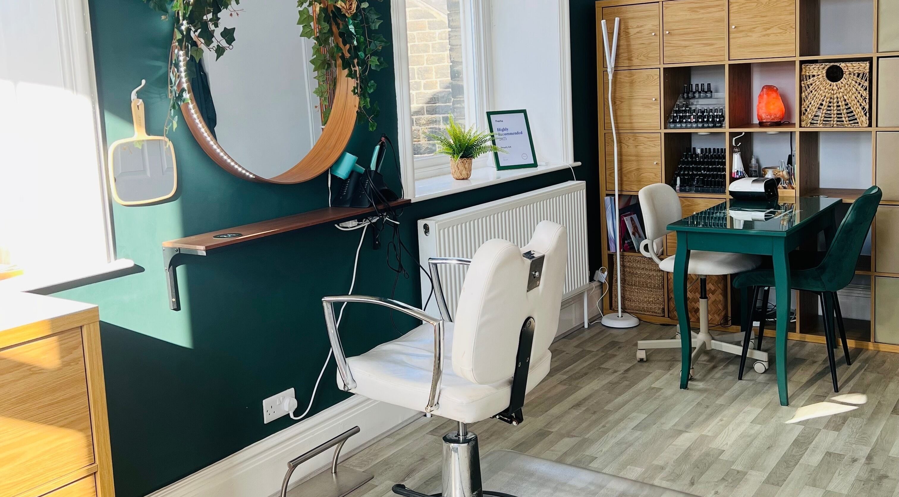 Elegant beauty station at Beauty 84, Sheffield, England, GB, featuring plush seating and stylish decor.