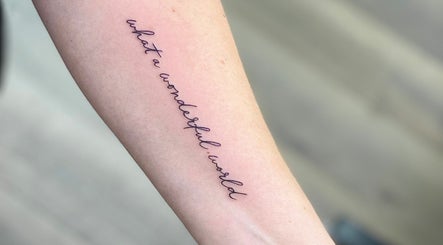 Envie Fine Line Tattoo