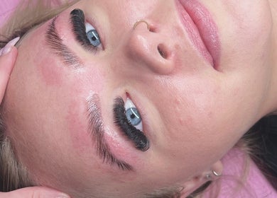 Lash enhancement at Estella Beauty in Morisset Park, New South Wales, AU. Close-up of styled brows and lashes.