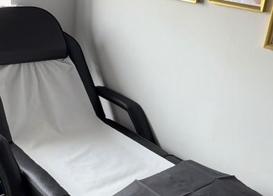 Relaxing treatment chair at Rebel Beauty by Danka in Birmingham, England, GB for ultimate comfort.
