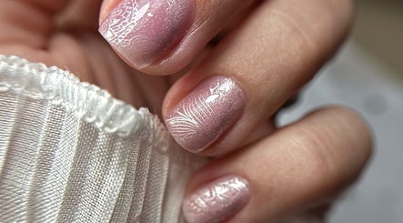 Delicate pink nail art with lace details at Rebel Beauty by Danka, Birmingham, England, GB.