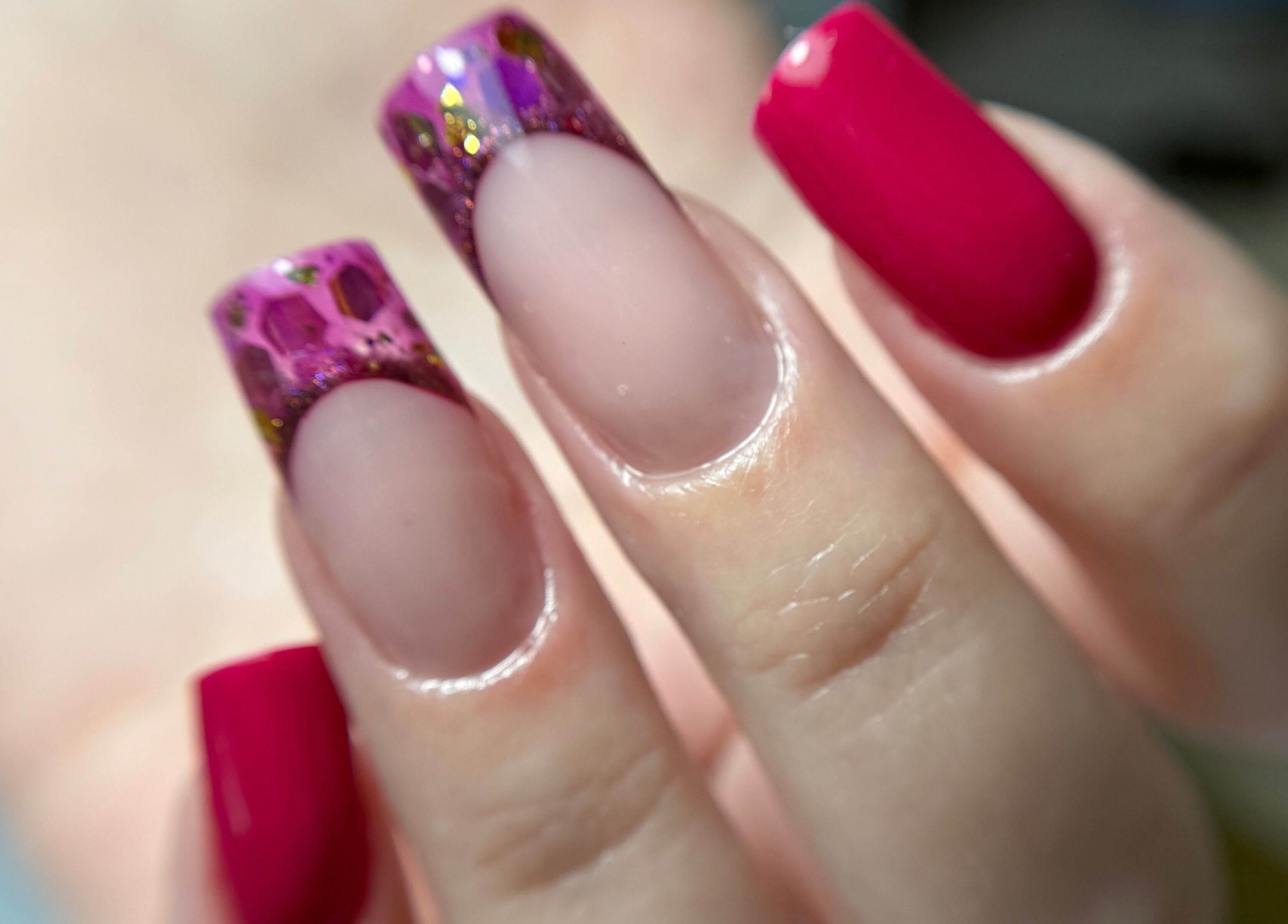 Stunning pink and glitter nail art at Rebel Beauty by Danka, Birmingham, England, GB.