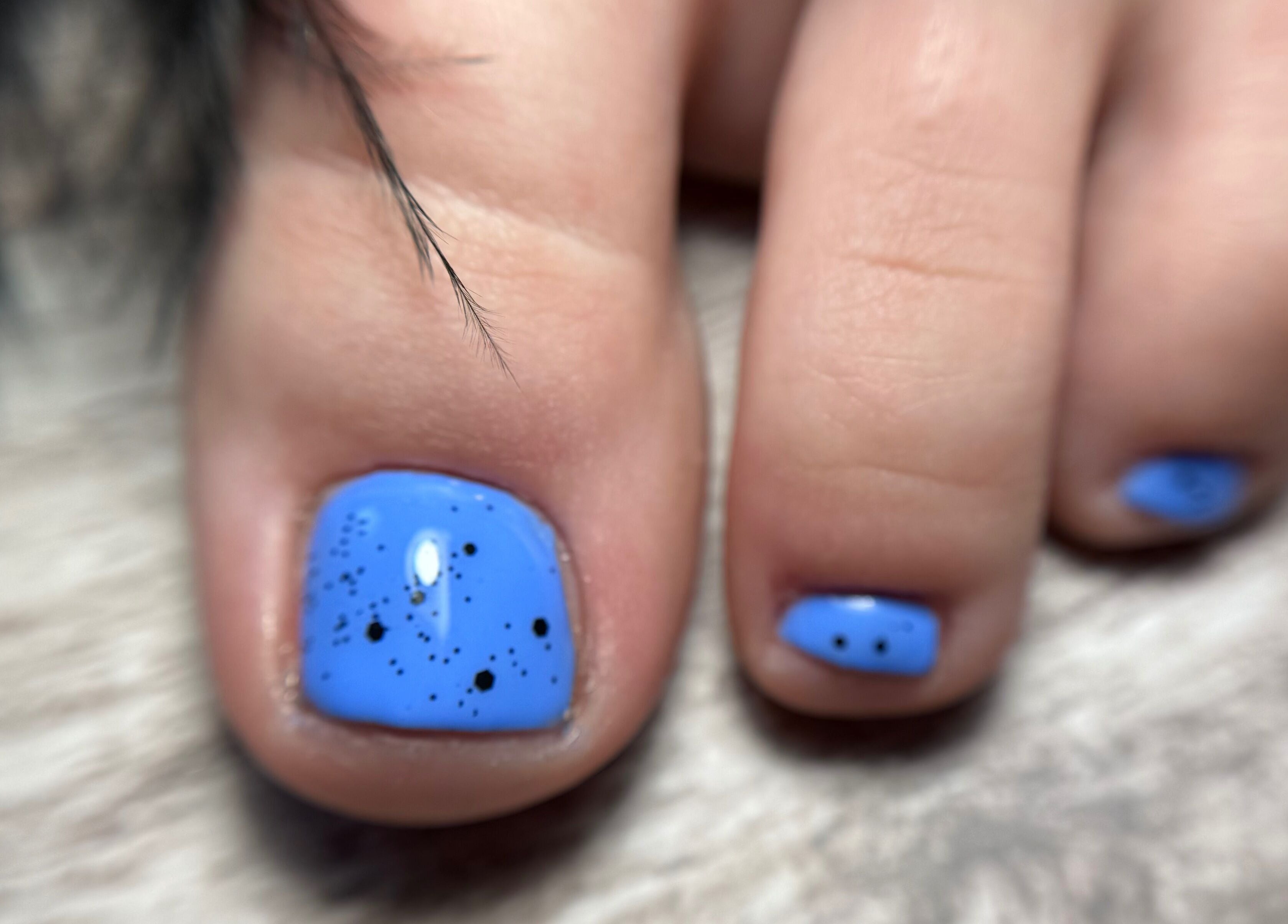 Blue speckled toenails styled at Rebel Beauty by Danka, Birmingham, England, GB.