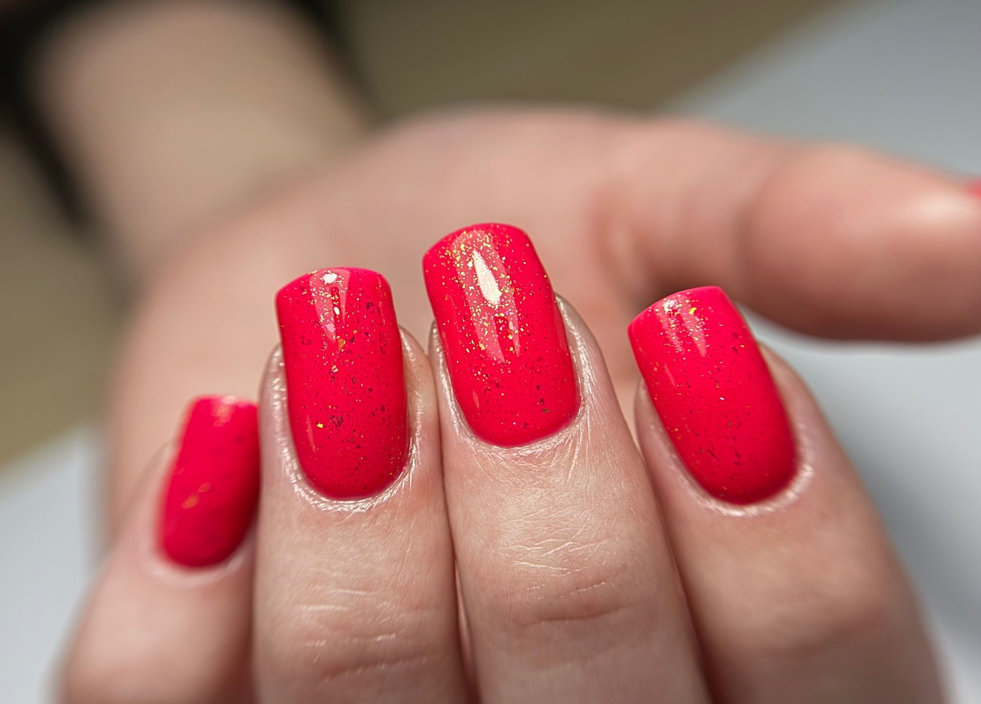 Stunning coral manicured nails at Rebel Beauty by Danka, Birmingham, England, GB.