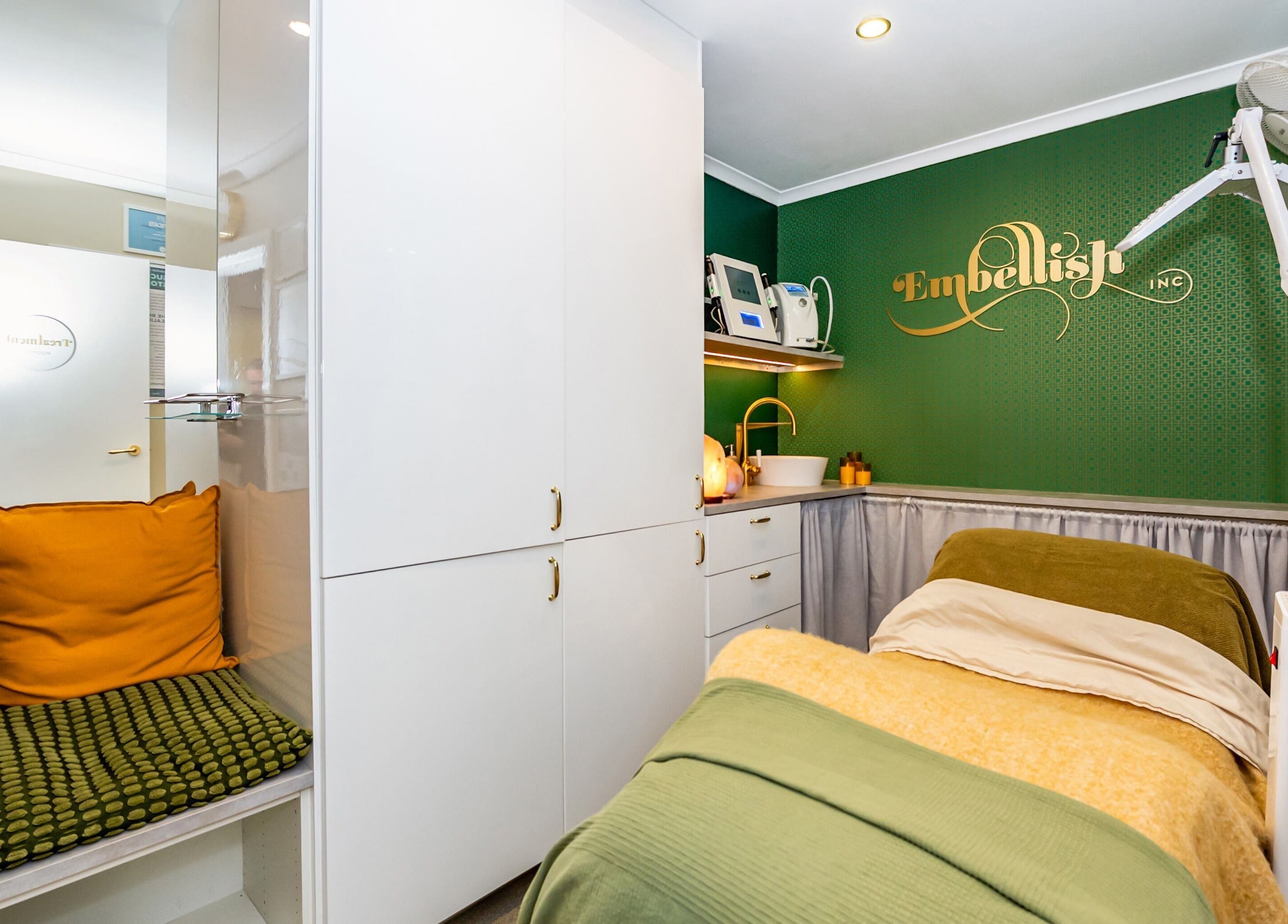 Inviting treatment room at Embellish Inc in Brookvale, NSW, AU featuring modern decor and warm tones.
