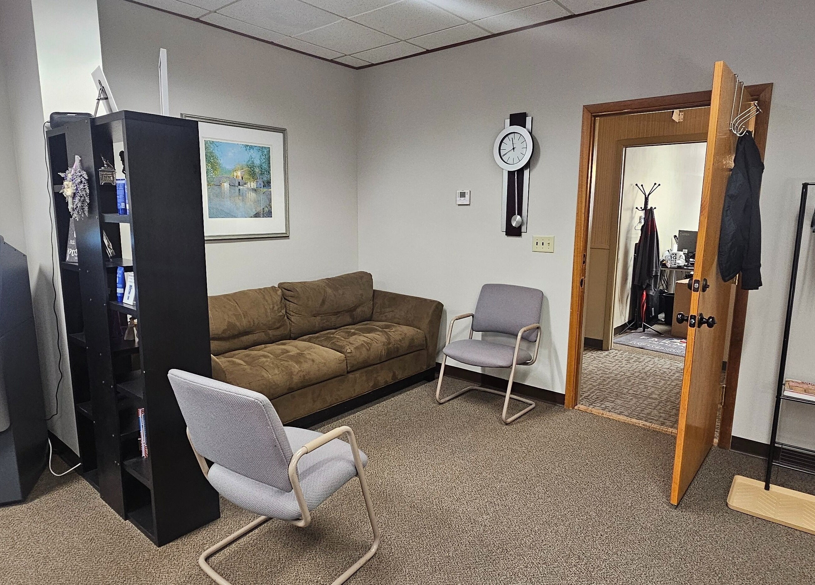 Relax in the cozy lounge of Sugar Body Eco-Spa, Buffalo, New York, US, with comfy seating and serene ambiance.