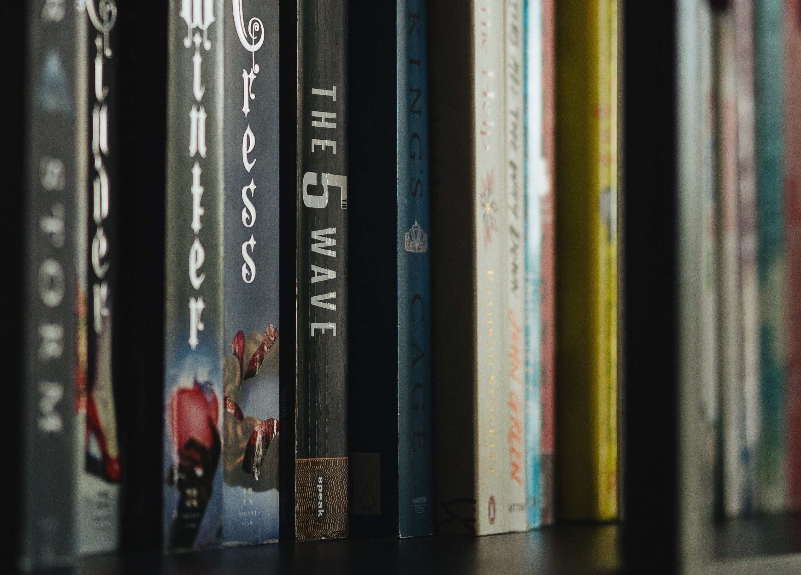 Elegant bookshelf at Ace of Fades Mens Salon, أبو ظبي, أبو ظبي, AE, adding a stylish touch to the salon atmosphere.