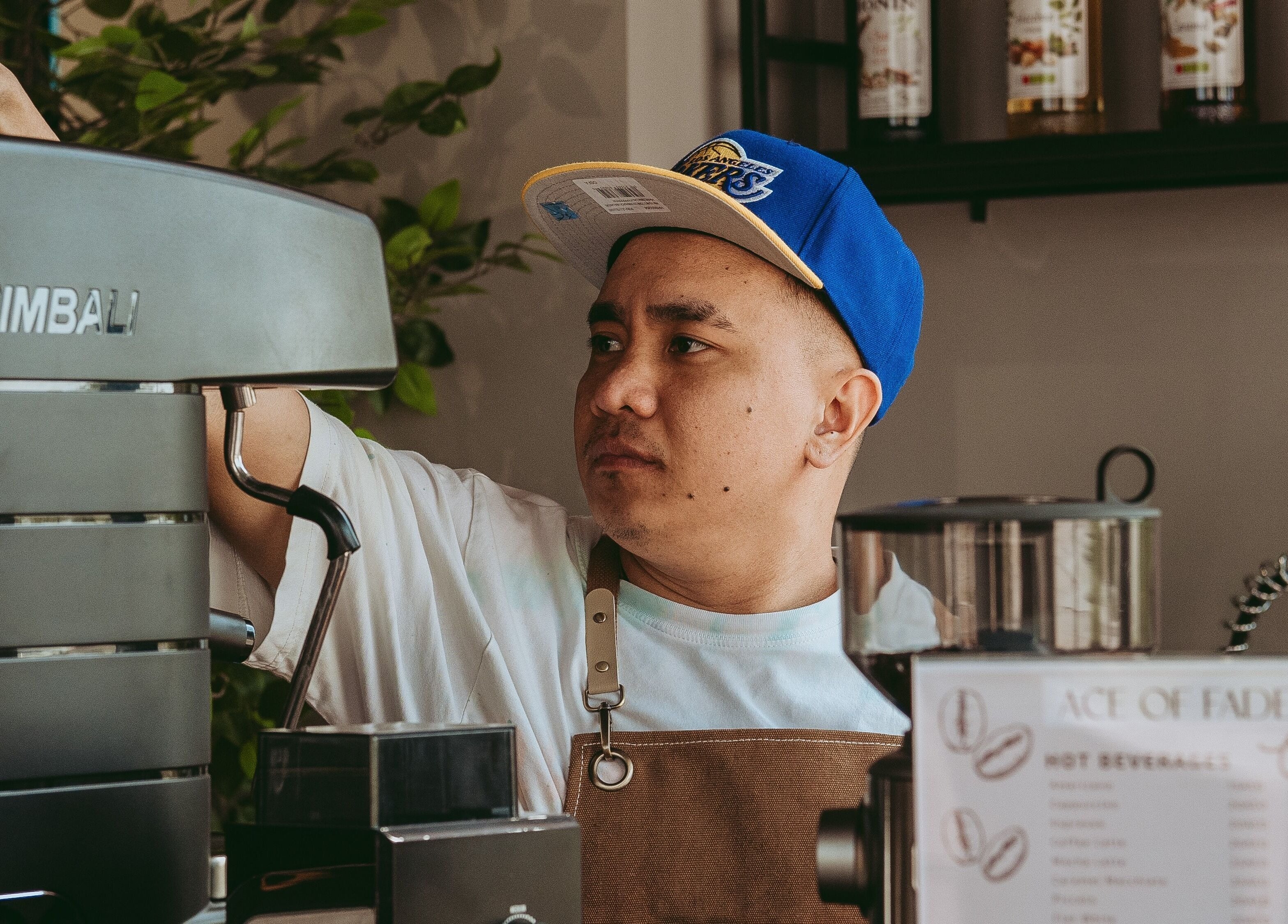 Barista preparing coffee at Ace of Fades Mens Salon, أبو ظبي, أبو ظبي, AE.
