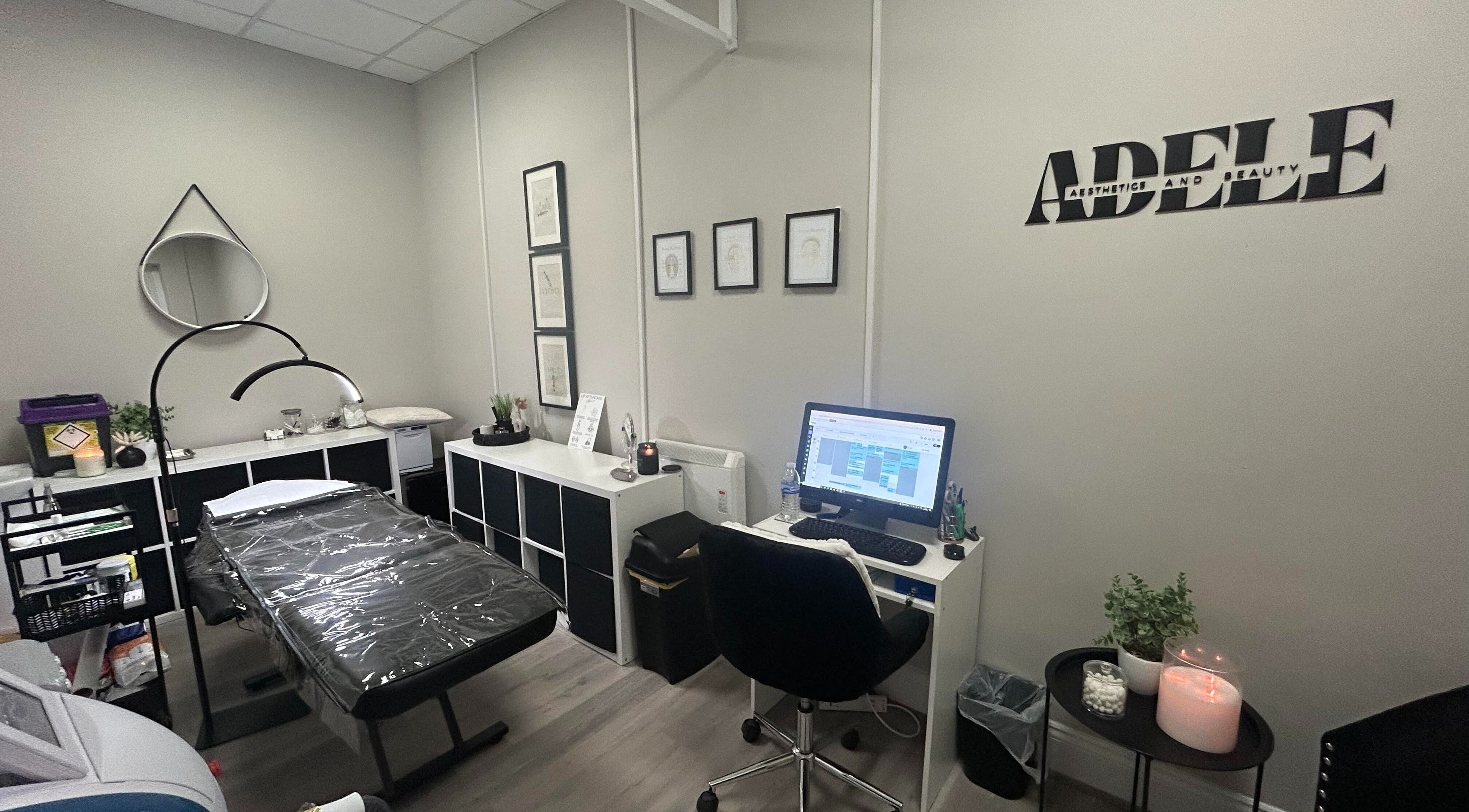 Modern treatment room at Adeles Aesthetics and Beauty, Seaham, England, GB, featuring a massage table and decor.