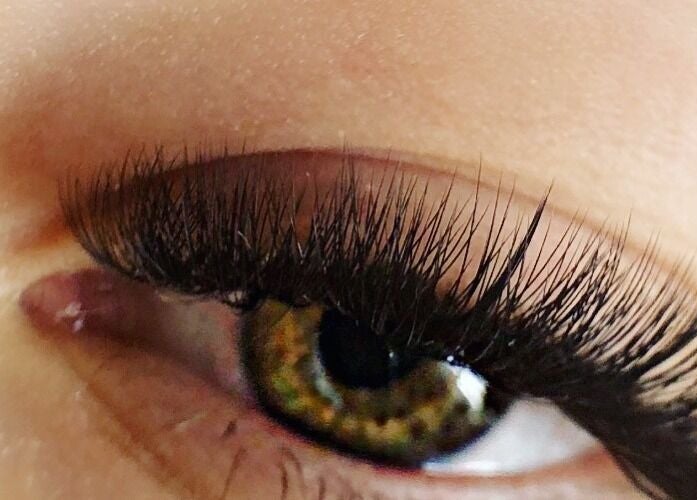 Close-up of expertly applied eyelash extensions at Wolfe Artistry in Kippax, England, GB.