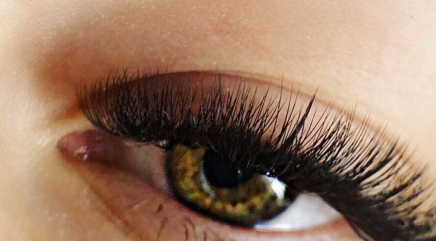 Close-up of expertly applied eyelash extensions at Wolfe Artistry in Kippax, England, GB.
