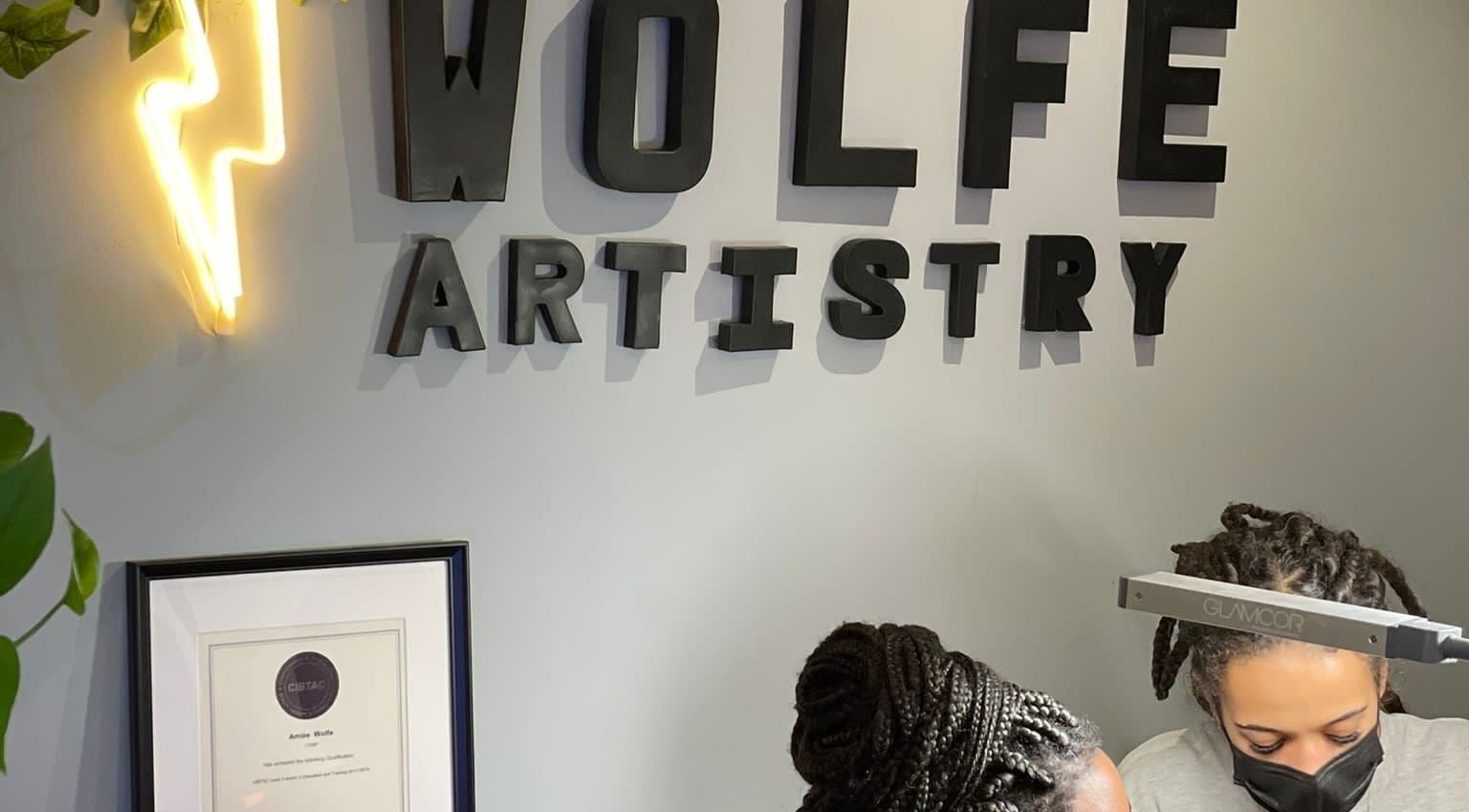 Wolfe Artistry venue interior with neon light in Kippax, England, GB.