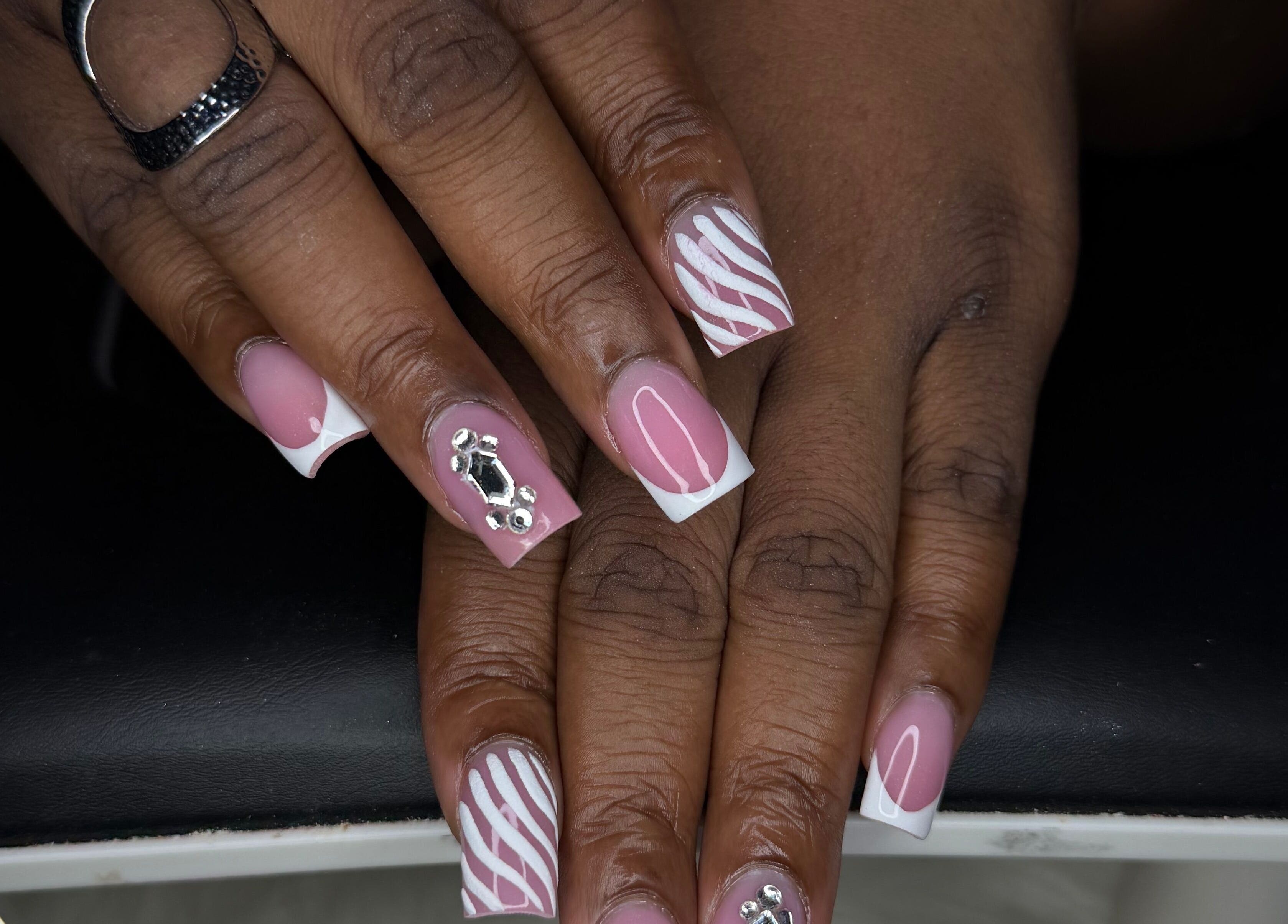 ChicTips by Rae offers elegant pink and white nail art in Charlotte, North Carolina, US.
