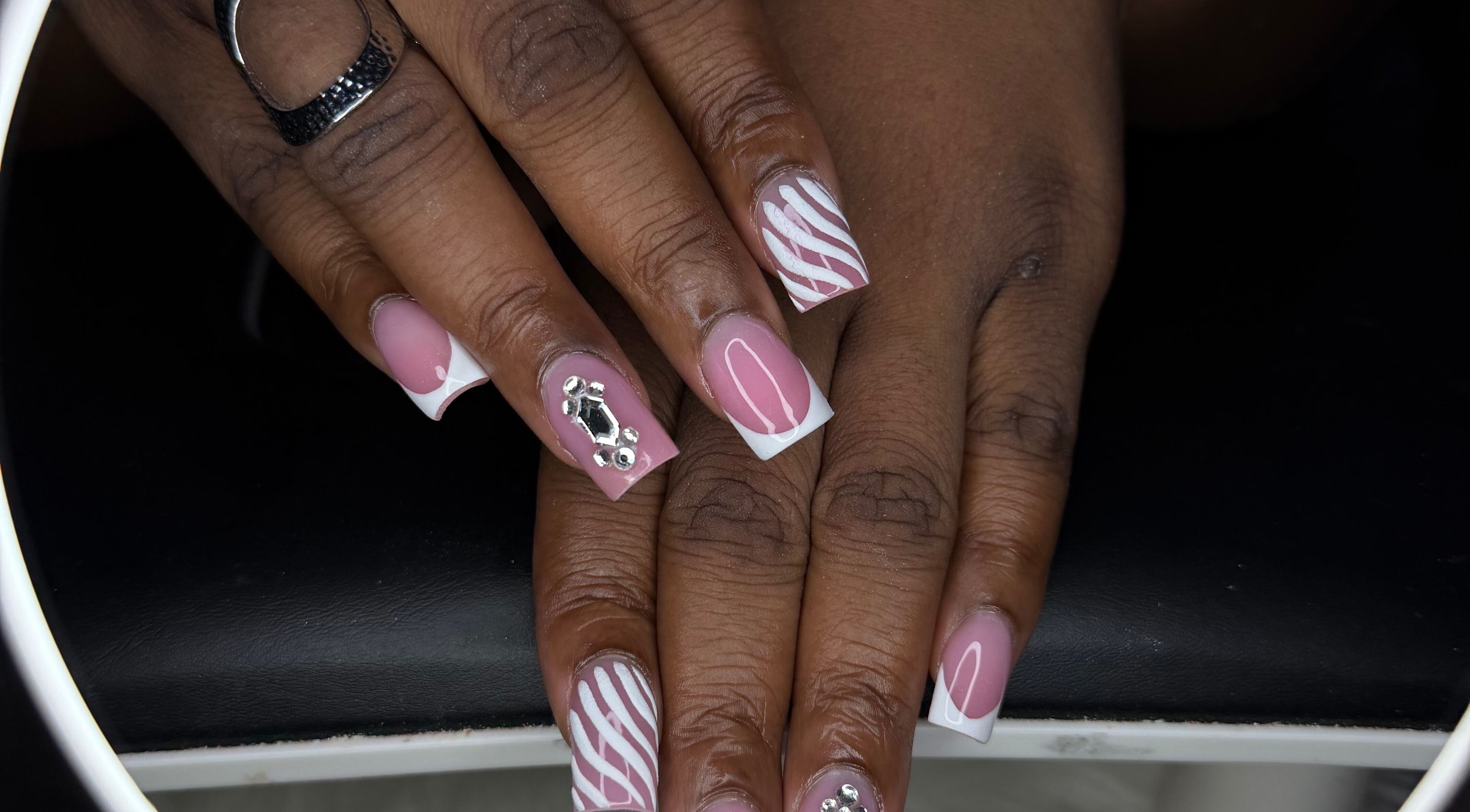 ChicTips by Rae offers elegant pink and white nail art in Charlotte, North Carolina, US.
