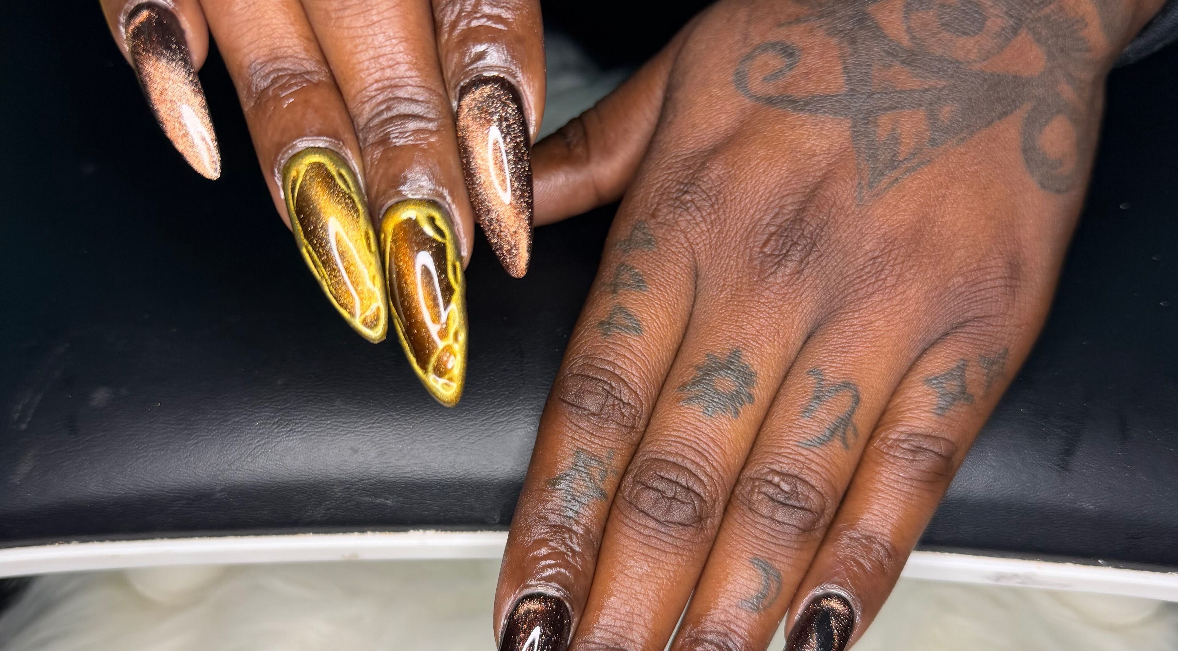 Stunning metallic nail art at ChicTips by Rae, Charlotte, North Carolina, US. Elegant and trendy manicure style.