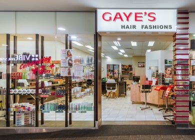 Entrance of Booval - Gaye's Hair Fashions in Booval, Queensland, AU showcasing products and seating.