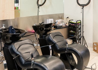 Chic wash stations at Booval - Gaye's Hair Fashions, Booval, Queensland, AU, showcasing modern salon style.