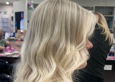 Blonde wavy hairstyle at Booval - Gaye's Hair Fashions, Booval, Queensland, AU.